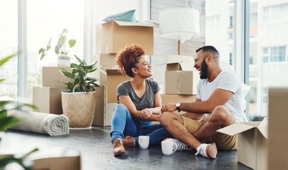 Image of family with moving boxes
